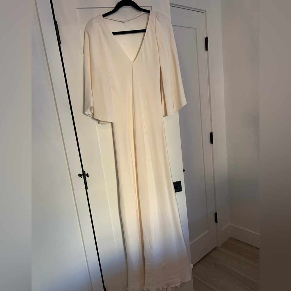 Lena Medoyeff off-white dress. Low back, big sleeves. Worn once & dry cleaned.